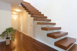 Why are wooden steps more hygienic than carpet?